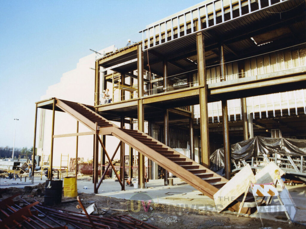 Nickelodeon Studios under construction at Universal Studios Florida, with the iconic exterior staircase taking shape in the foreground.